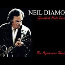 Singer Neil Diamond performing onstage