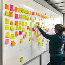 A brainstorming workspace covered with idea notes