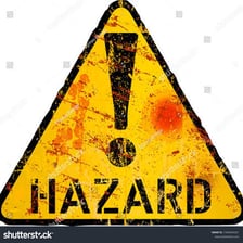 A warning sign representing danger or risk