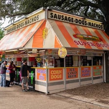 A small stand serving food at a state fair