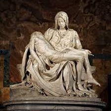 Michelangelo’s Pietà sculpture showing Mary holding the body of Jesus.