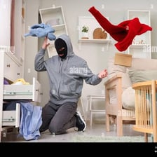 A person inquisitively looking through the contents of a drawer