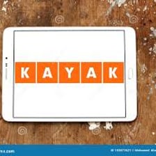 A kayak boat alongside the KAYAK travel brand