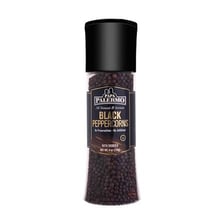 Black pepper being ground from a pepper mill