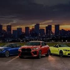 Several BMW automobiles shown together.