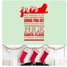 Santa Claus reading a list while checking items