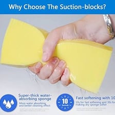 A sponge soaking up water from a surface.