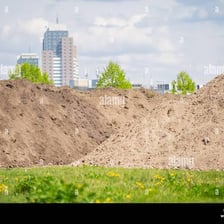 Several large piles of loose earth