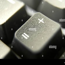 A keyboard with the plus key visible