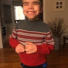 A young boy representing the informal phrase “little fella”