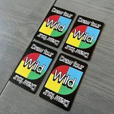 UNO cards including a Wild Draw Four card.