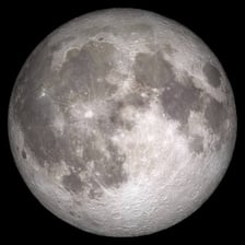 A bright full Moon in the night sky