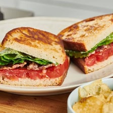 A BLT sandwich showing bacon, lettuce, and tomato