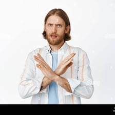 A person shaking their head to indicate refusal