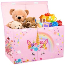 Colorful children's toys beside a gift box