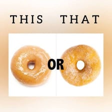 A ring-shaped glazed donut with a clearly visible central hole