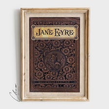 A vintage book cover for Charlotte Brontë's novel Jane Eyre