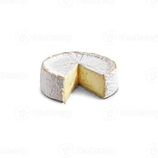 A wheel of brie cheese cut open to show its soft interior