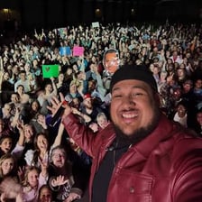 A fan admiring a highly celebrated performer.
