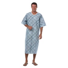 A hospital patient wearing a standard medical gown