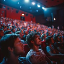 An audience watching a performance with absorbed attention