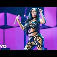 Nicki Minaj performing onstage.