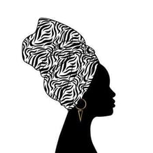 A portrait or silhouette representing a woman.