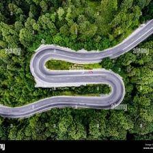A road curving through a landscape