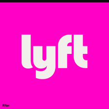 A Lyft rideshare vehicle displaying the company's logo