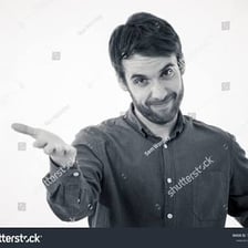A person making a triumphant I-told-you-so gesture.