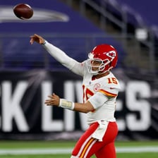 A quarterback throwing a football