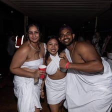 People wearing toga costumes at a college party
