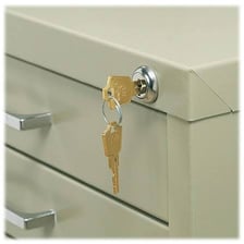 A lock on the drawer of a filing cabinet