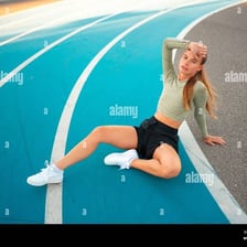 An exhausted runner resting after physical exertion