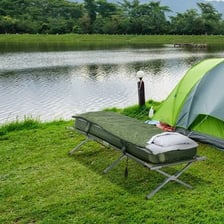 A small portable folding bed