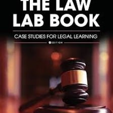 A student studying books about law.