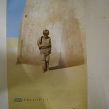 The Phantom Menace poster showing young Anakin Skywalker with Darth Vader’s shadow