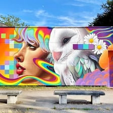 A colorful mural painted on the exterior wall of a public building