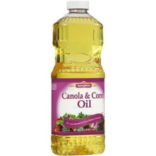 Bottles of canola oil and corn oil.