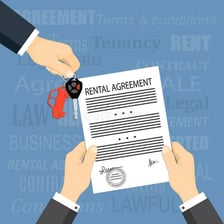 A renter receiving apartment keys after signing a lease.