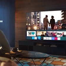 A television set displaying a program on its screen.