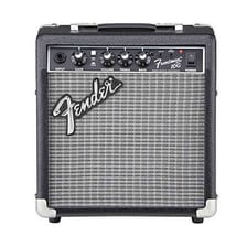 An amplifier connected to an electric guitar