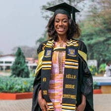 Graduates wearing colorful ceremonial sashes