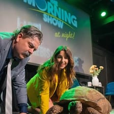 Performers presenting a short comedy scene on a variety-show stage