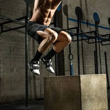 A person preparing to begin a challenging jump.