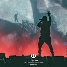 DJ Snake performing at an electronic music event