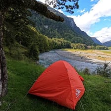 A camping tent set up outdoors