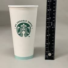 A Starbucks hot-drink cup labeled Venti.