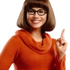 Velma Dinkley, the bespectacled mystery-solving character from Scooby-Doo.