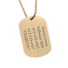 A pair of metal military identification tags on a chain.